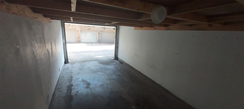 7340 Skillman Street, Unit 512 Dallas, TX 75231 - Photo 13 of 15 a view of hallway with wooden floor