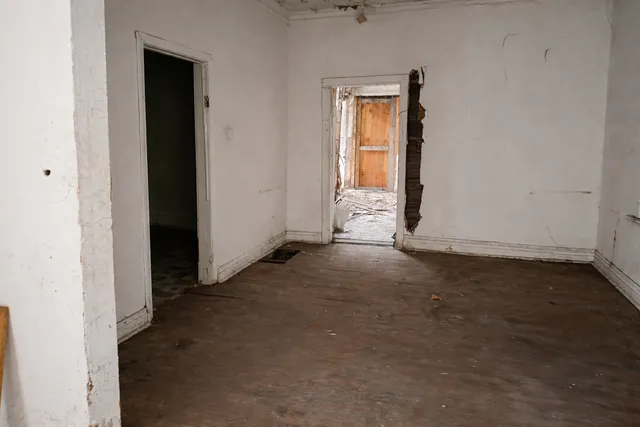 an empty room that has a window