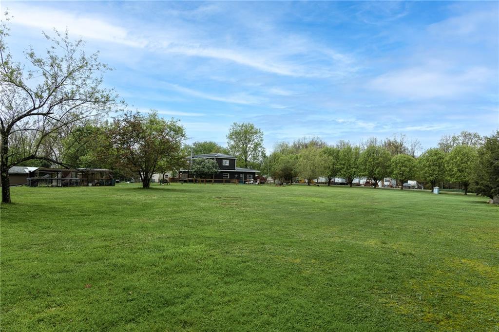 118 Eau Claire Road Boyers, PA 16020 - Photo 11 of 24 a view of field with trees in the background