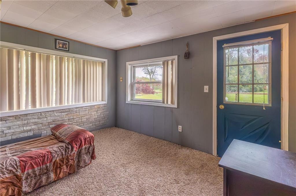 118 Eau Claire Road Boyers, PA 16020 - Photo 19 of 24 a bedroom with a bed and a window