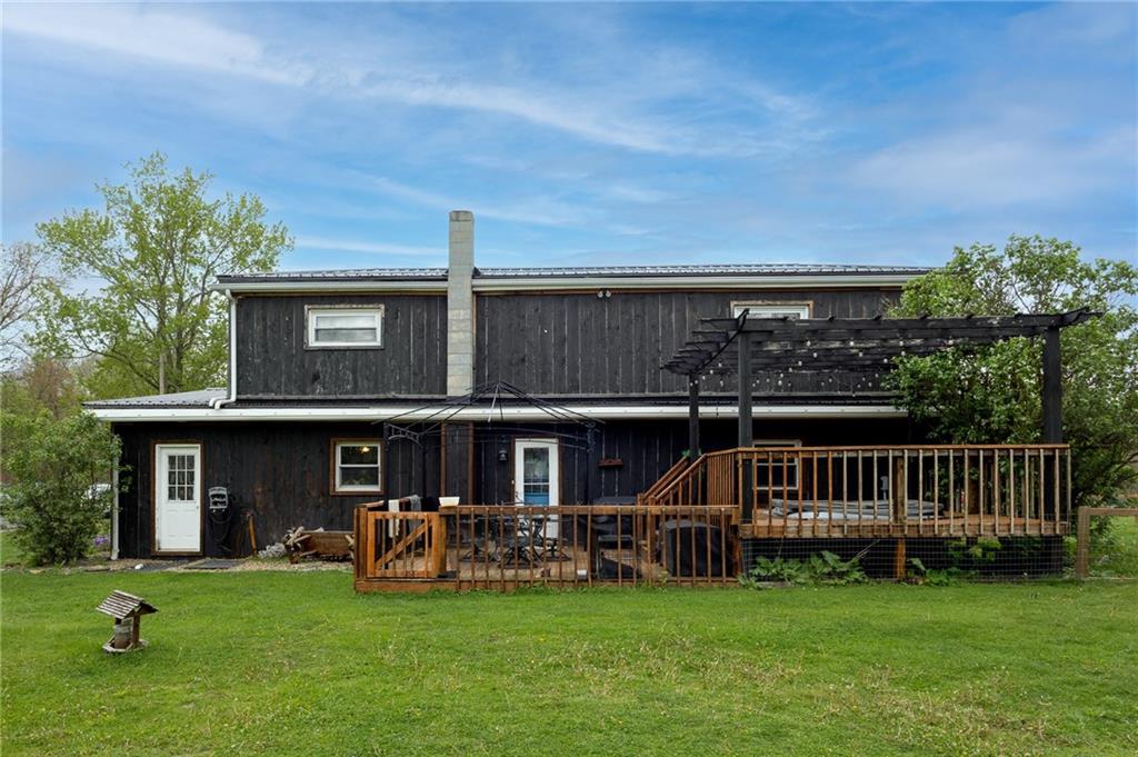 118 Eau Claire Road Boyers, PA 16020 - Photo 3 of 24 a view of a house with a yard and deck
