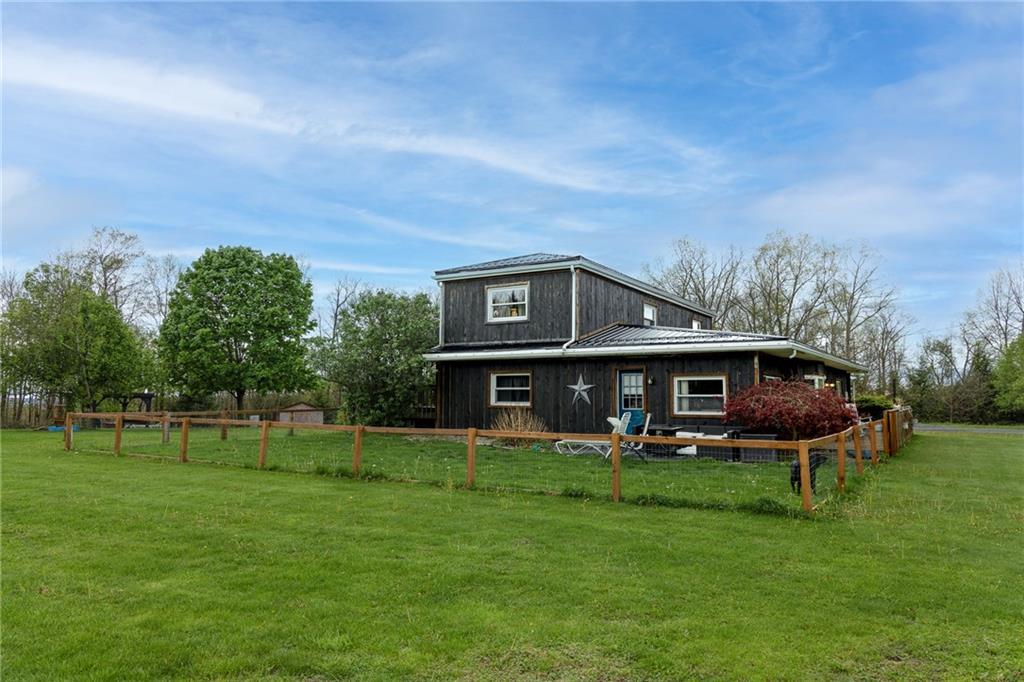 118 Eau Claire Road Boyers, PA 16020 - Photo 4 of 24 a view of a house with a big yard