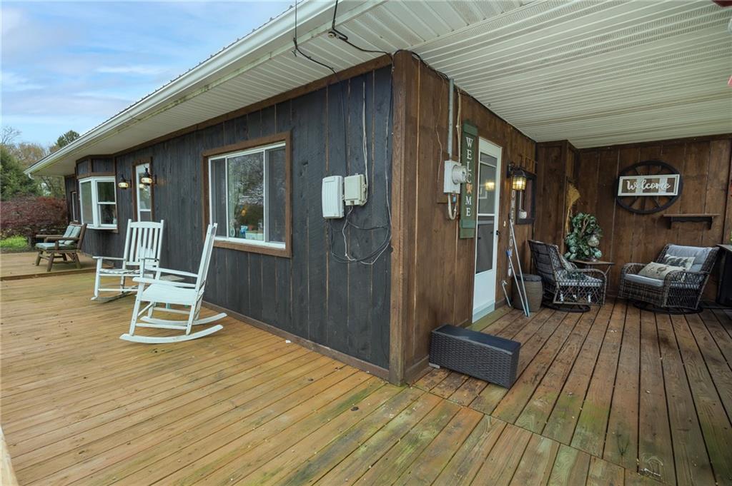 118 Eau Claire Road Boyers, PA 16020 - Photo 7 of 24 a view of a patio with table and chairs