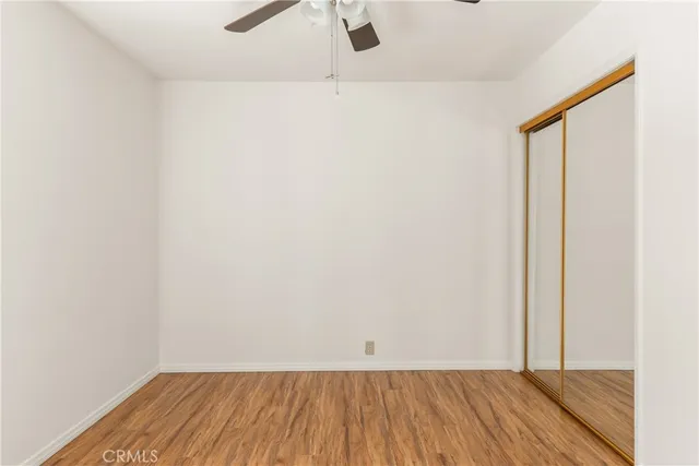 a view of small space with wooden floor