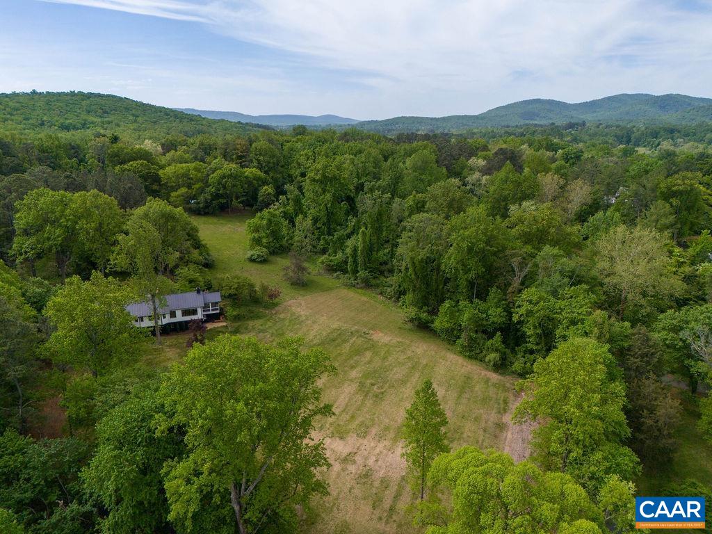 25 Old Farm Road Charlottesville, VA 22903 - Photo 43 of 49 a view of a lush green forest with trees and some houses