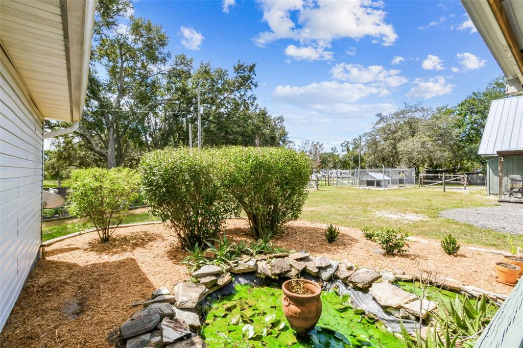 15019 Carlton Lake Road Wimauma, FL 33598 - Photo 68 of 89 a view of yard with seating space