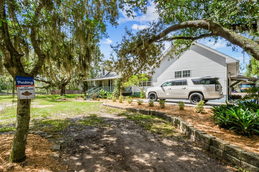 15019 Carlton Lake Road Wimauma, FL 33598 - Photo 8 of 89 a front view of a house with a yard