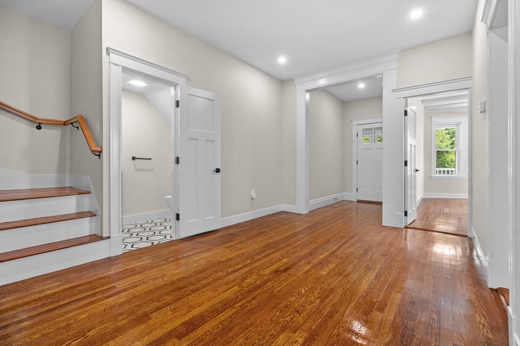 37 George Street, Unit 37 Newton, MA 02458 - Photo 19 of 35 a view of empty room with wooden floor and fan