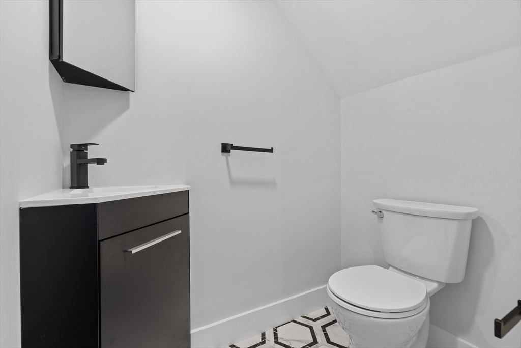 37 George Street, Unit 37 Newton, MA 02458 - Photo 21 of 35 a bathroom with a toilet and a sink