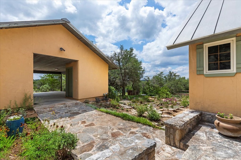 4946 Ranch Road Dripping Springs, TX 78620 - Photo 45 of 64 walk area between house and carport
