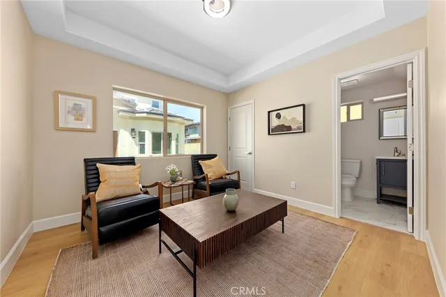 a bathroom with a toilet sink and shower