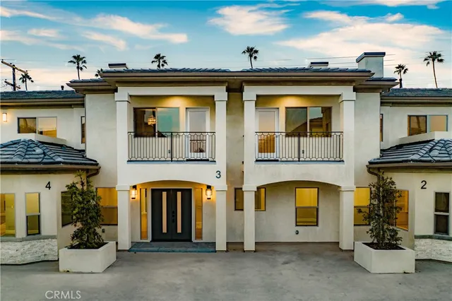 a view of a street with a building in the background
