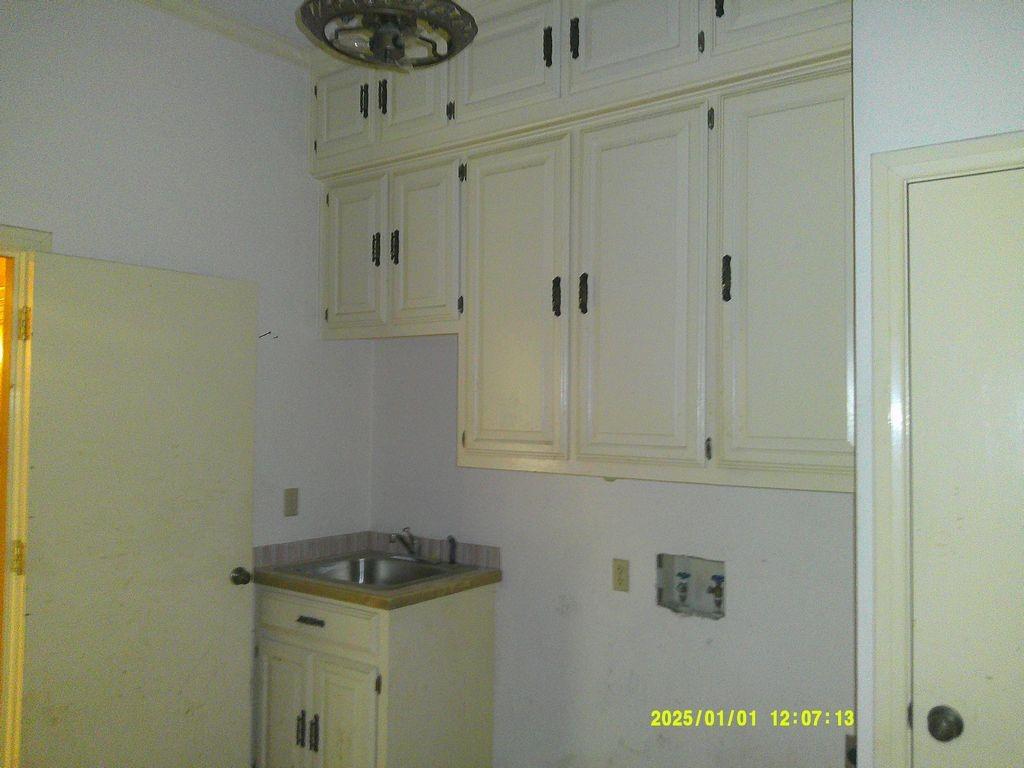 3726 County Road 4284 Simms, TX 75574 - Photo 21 of 26 a bathroom with a granite countertop sink and vanity
