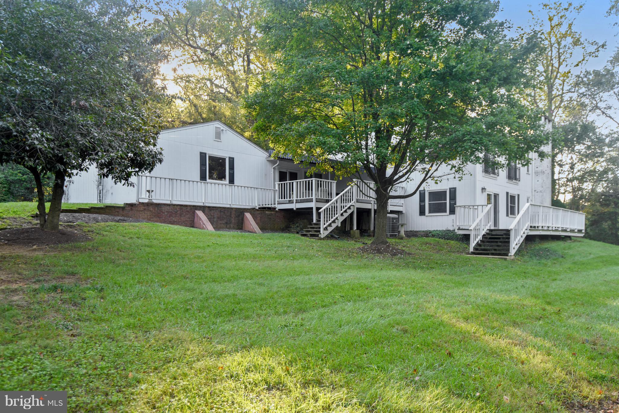 1800 Hidden Point Road Annapolis, MD 21409 - Photo 26 of 30 Showing multiple decks and expansive yard