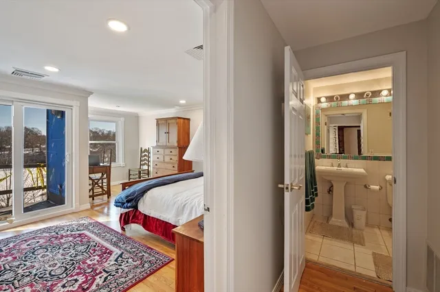 a walk in closet with a mirror