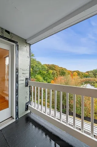 a view of a room with a large window