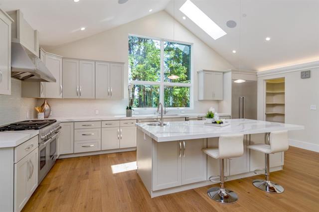 110 Stadler Drive Woodside, CA 94062 - Photo 11 of 27 a kitchen with sink stove and cabinets