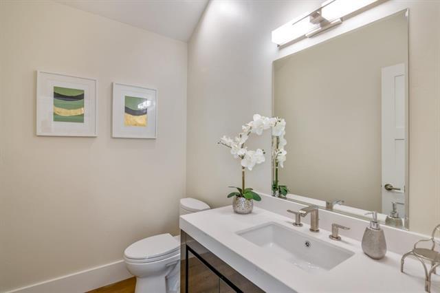 110 Stadler Drive Woodside, CA 94062 - Photo 12 of 27 a bathroom with a sink vanity mirror and toilet