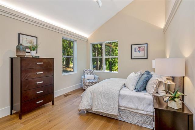 110 Stadler Drive Woodside, CA 94062 - Photo 13 of 27 a bedroom with a bed and a window
