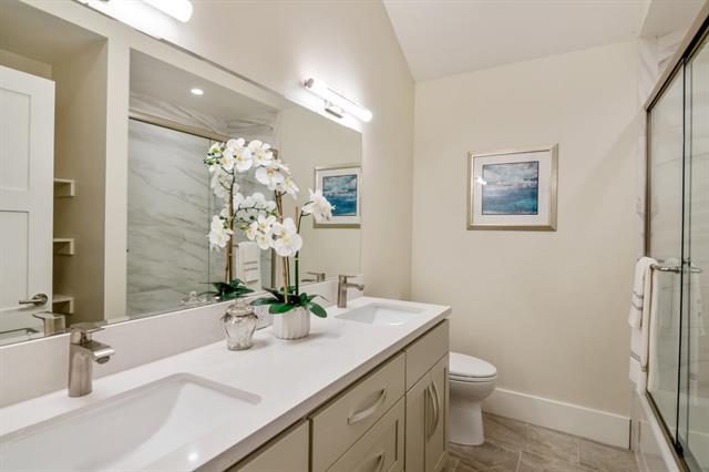110 Stadler Drive Woodside, CA 94062 - Photo 16 of 27 a bathroom with a sink a toilet and shower