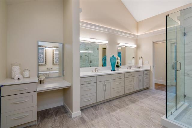 110 Stadler Drive Woodside, CA 94062 - Photo 21 of 27 a bathroom with a double vanity sink and a mirror