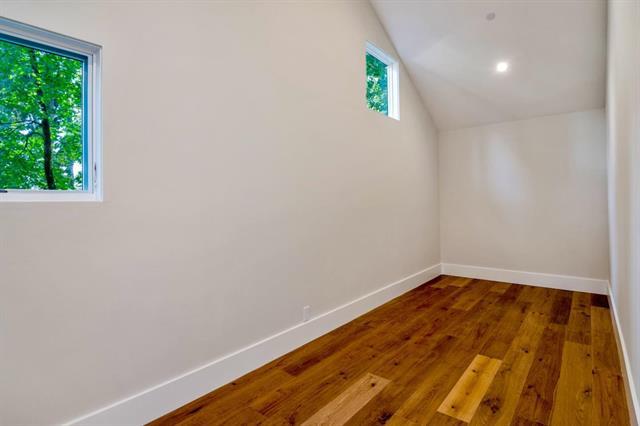 110 Stadler Drive Woodside, CA 94062 - Photo 22 of 27 a view of empty room with wooden floor and fan