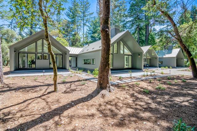 110 Stadler Drive Woodside, CA 94062 - Photo 3 of 27 a house with trees in front of it