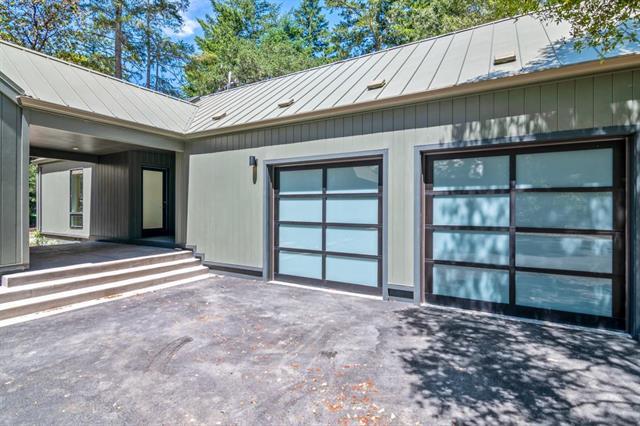 110 Stadler Drive Woodside, CA 94062 - Photo 5 of 27 a front view of a house with a window
