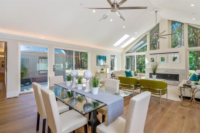 110 Stadler Drive Woodside, CA 94062 - Photo 7 of 27 a living room with furniture dining table and a large window