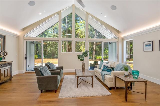 110 Stadler Drive Woodside, CA 94062 - Photo 9 of 27 a living room with furniture and a large window