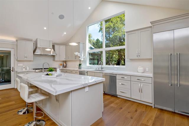110 Stadler Drive Woodside, CA 94062 - Photo 10 of 27 a kitchen with a stove a sink and a refrigerator