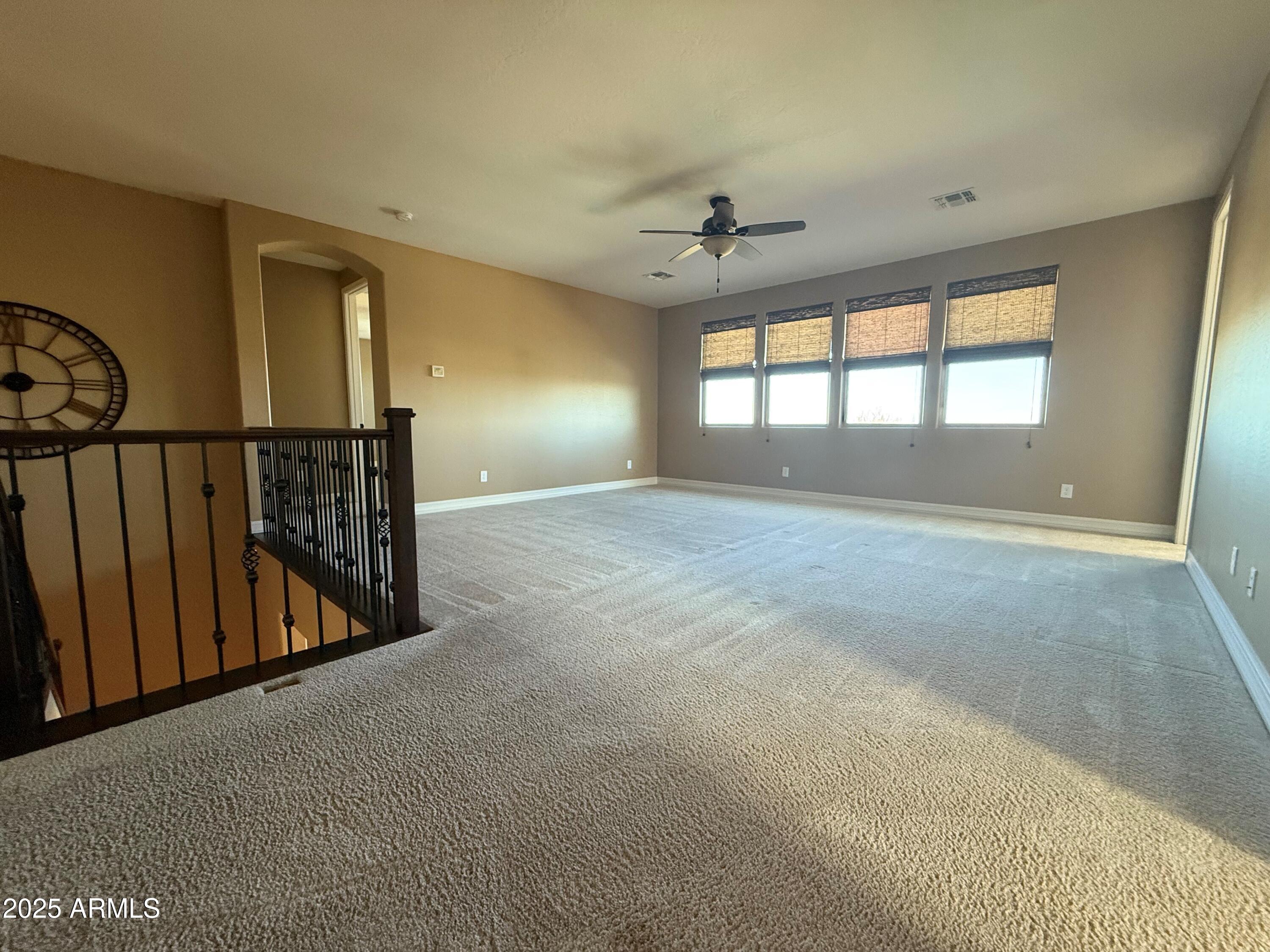 2709 North Black Rock Road Buckeye, AZ 85396 - Photo 29 of 74 a view of an empty room with a window