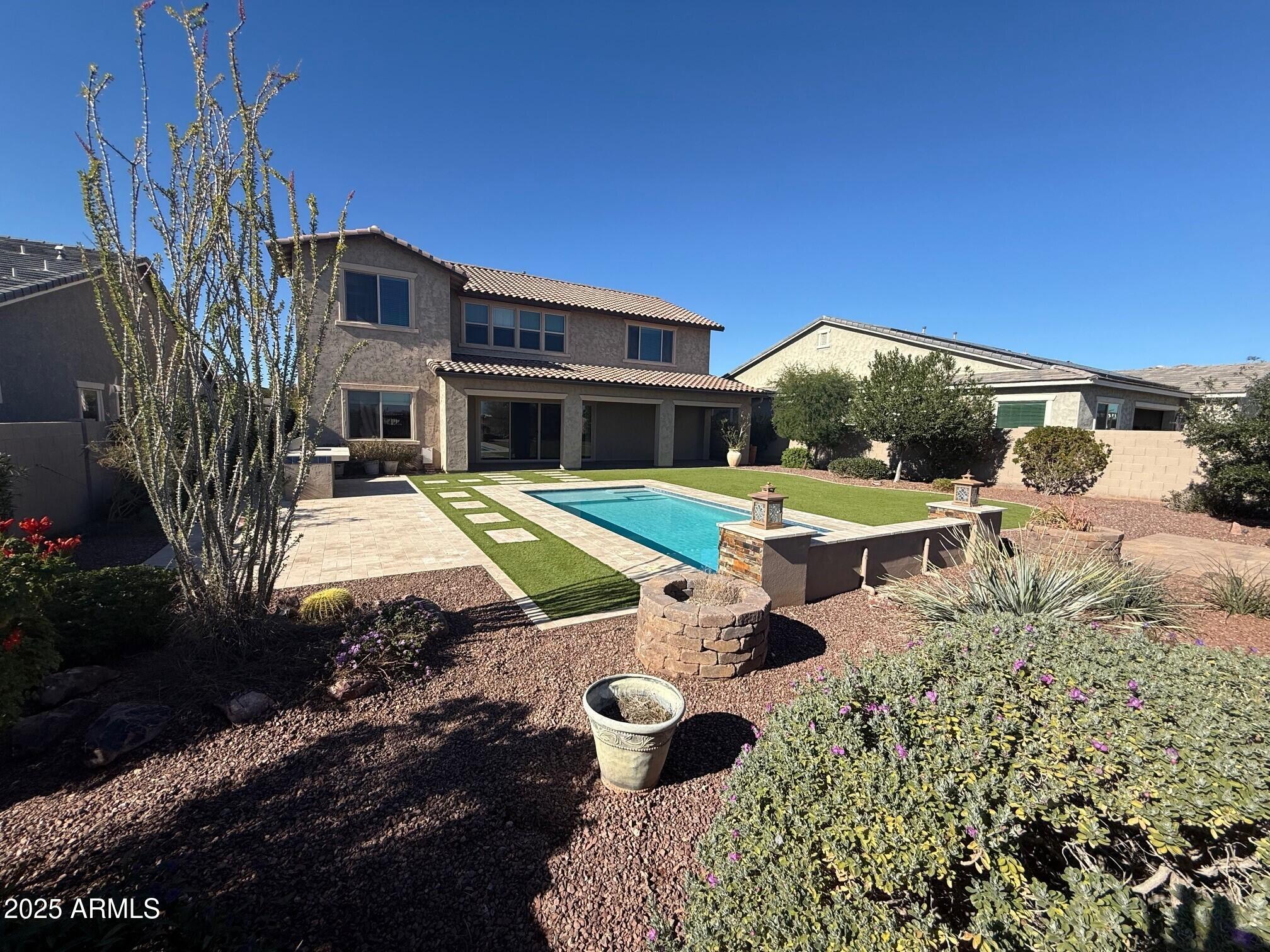 2709 North Black Rock Road Buckeye, AZ 85396 - Photo 62 of 74 a view of an house with backyard space and balcony