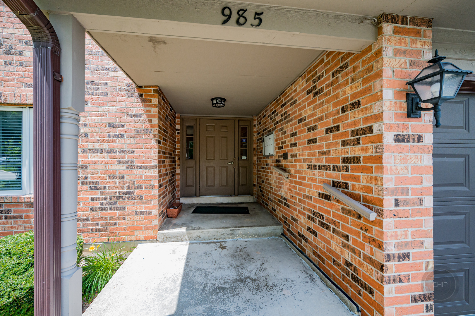 985 West Court, Unit D Naperville, IL 60563 - Photo 2 of 29 a view of outdoor space with balcony