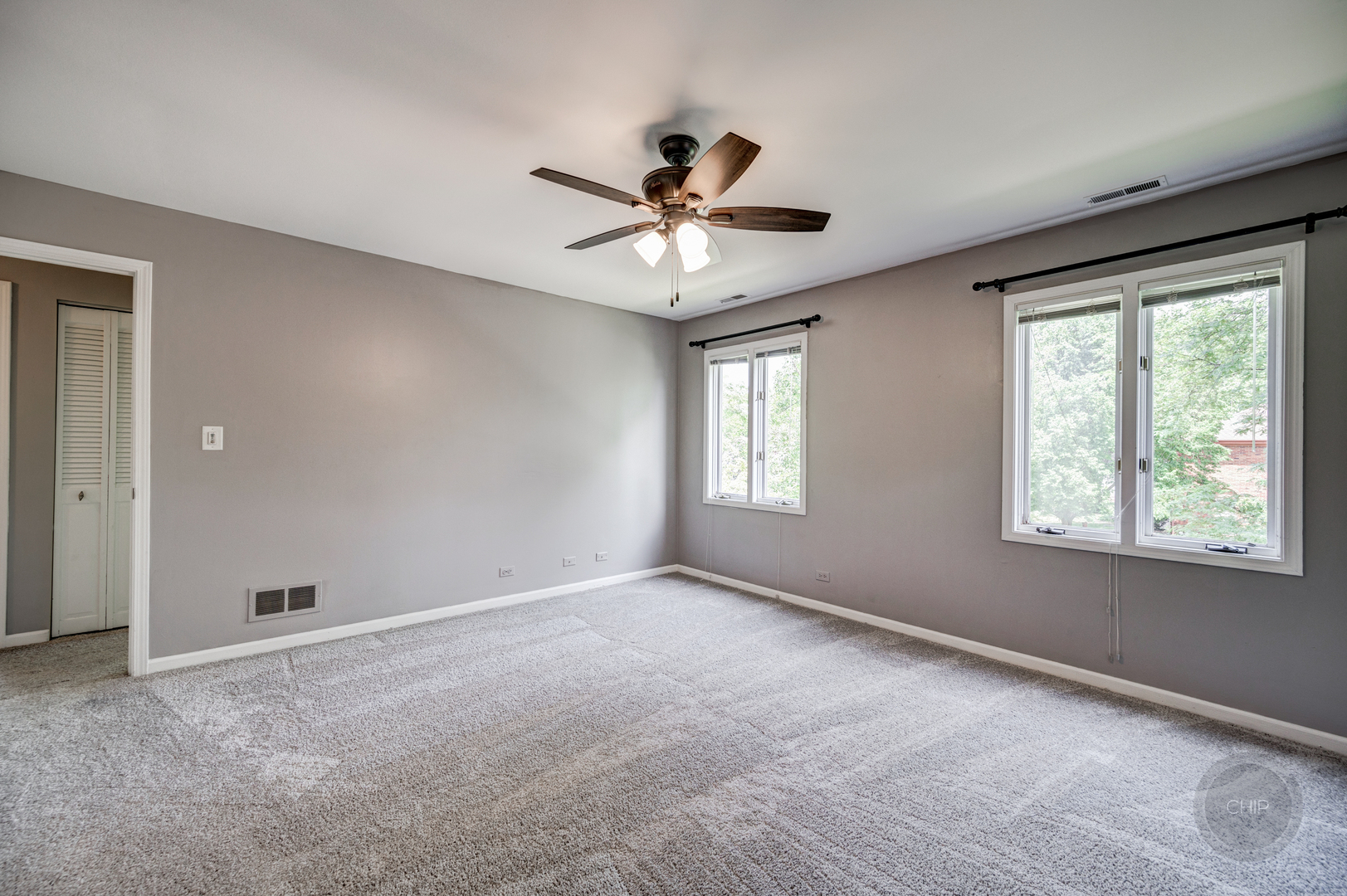 985 West Court, Unit D Naperville, IL 60563 - Photo 20 of 29 a view of an empty room with a window
