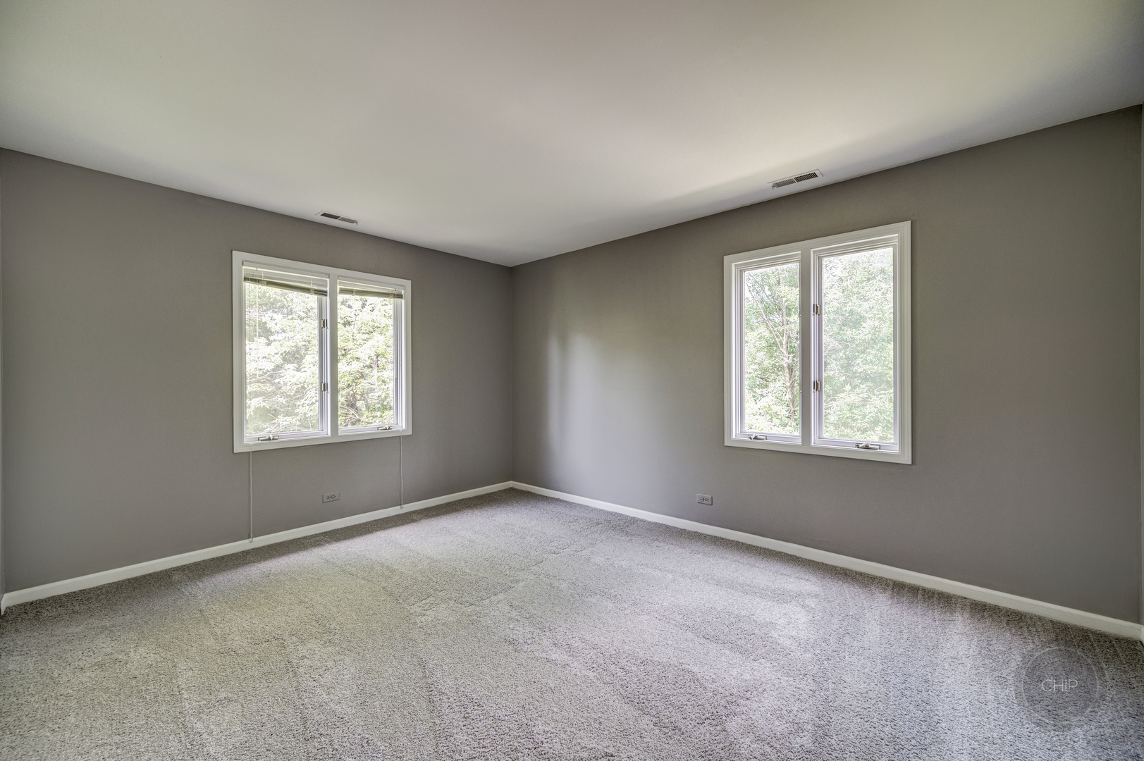 985 West Court, Unit D Naperville, IL 60563 - Photo 21 of 29 an empty room with windows