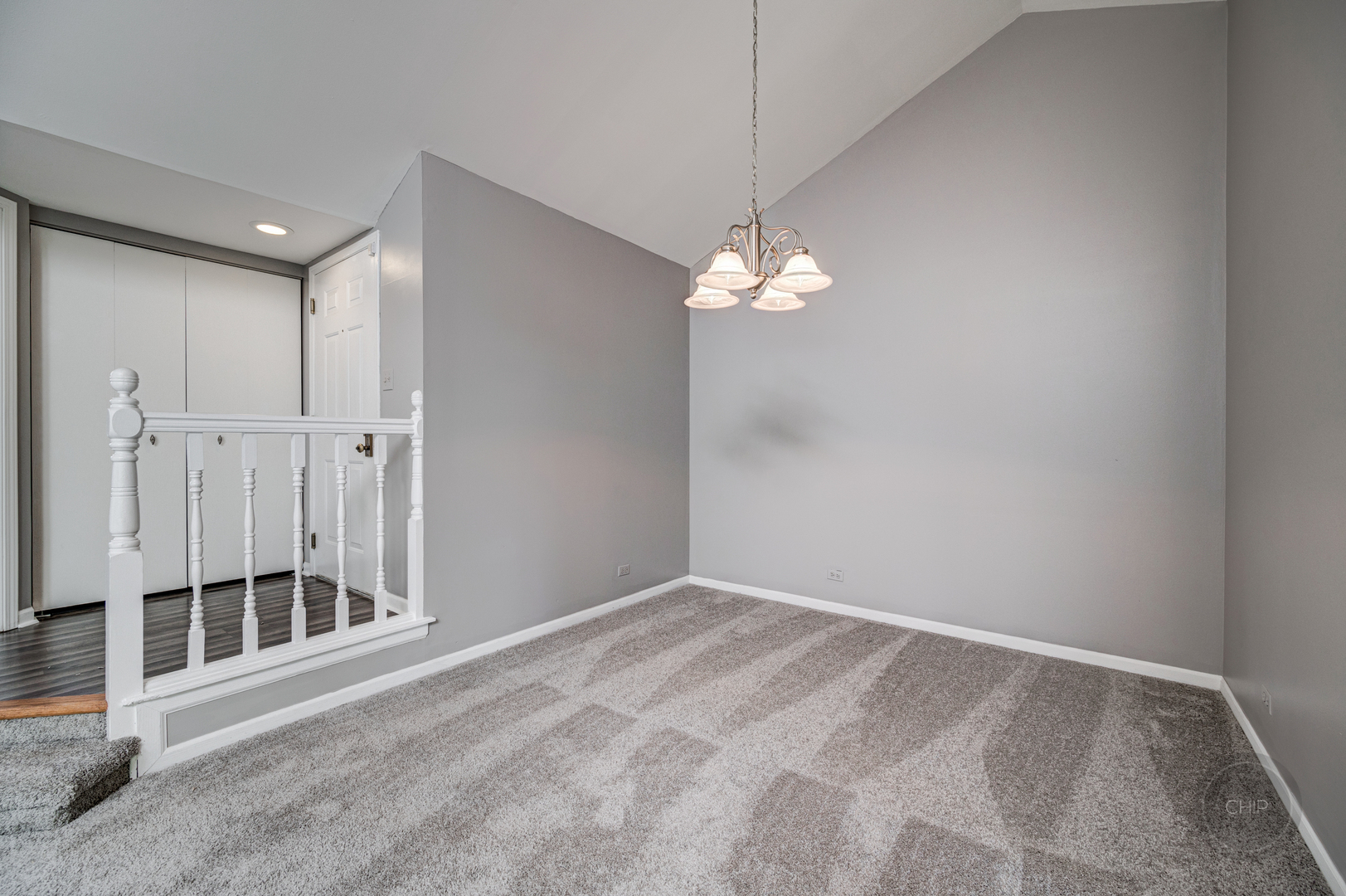 985 West Court, Unit D Naperville, IL 60563 - Photo 5 of 29 a view of a livingroom with a chandelier fan