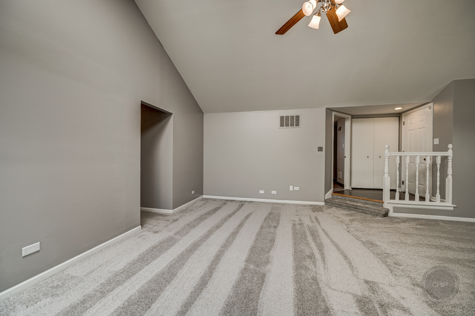 985 West Court, Unit D Naperville, IL 60563 - Photo 10 of 29 a view of a livingroom with a staircase