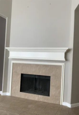 a close view of fireplace and a hallway