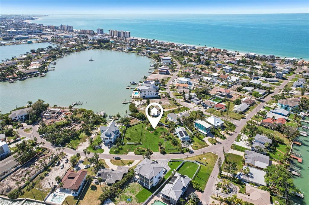 15825 Redington Drive Redington Beach, FL 33708 - Photo 22 of 27 an aerial view of a house with a lake view