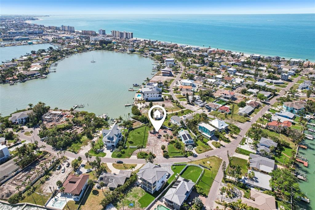 15825 Redington Drive Redington Beach, FL 33708 - Photo 4 of 27 an aerial view of a house with a lake view