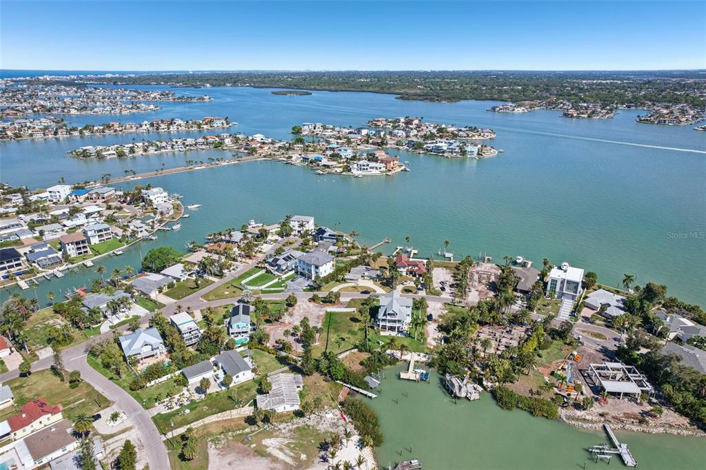 15825 Redington Drive Redington Beach, FL 33708 - Photo 8 of 27 an aerial view of a houses with a lake view