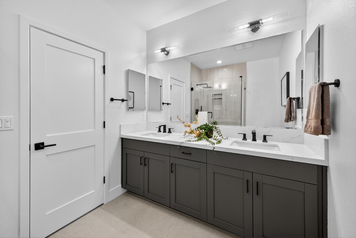 955 Woodside Road Redwood City, CA 94061 - Photo 36 of 46 a bathroom with a double vanity sink mirror and double