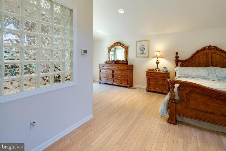 1914 Suffolk Road Finksburg, MD 21048 - Photo 10 of 30 a bedroom with a bed dresser and a window
