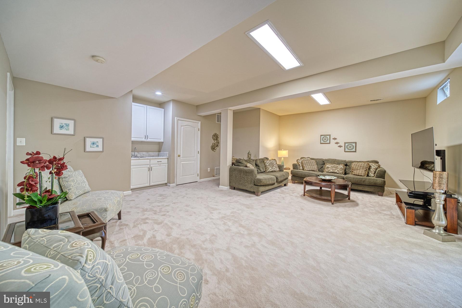 1321 Gatesmeadow Way Reston, VA 20194 - Photo 32 of 62 Lower Level Large Rec Room
