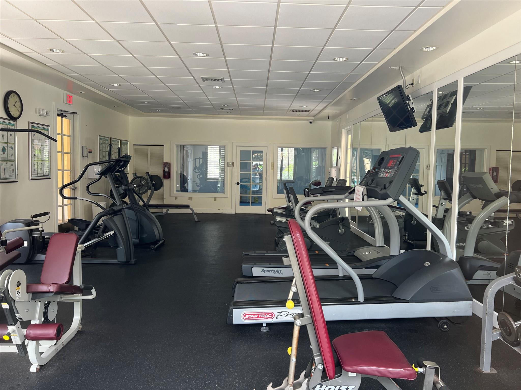 6812 West Sample Road, Unit 6812 Coral Springs, FL 33067 - Photo 27 of 27 a view of a room with gym equipment