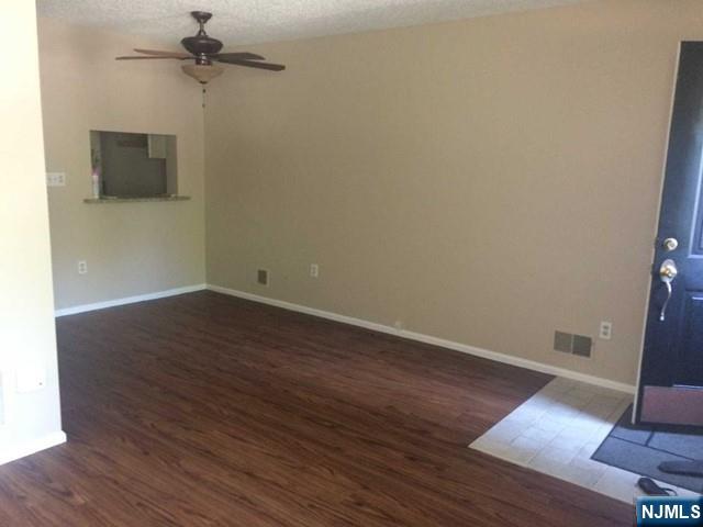 808 Sassafras Court, Unit 808 Mahwah, NJ 07430 - Photo 3 of 4 wooden floor in an empty room
