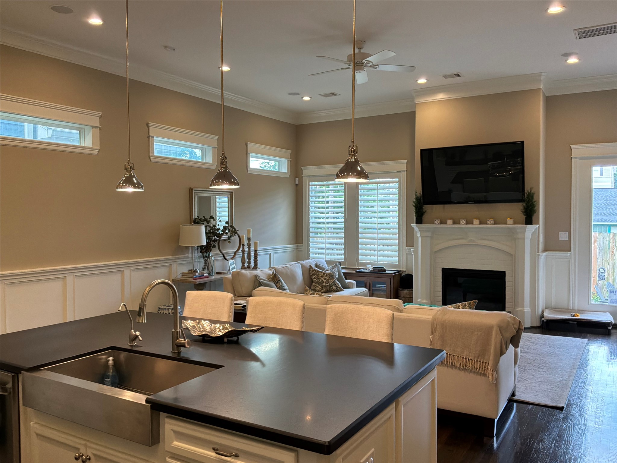 922 Alexander Street Houston, TX 77008 - Photo 12 of 43 Kitchen view into living with new wood shutters now.
