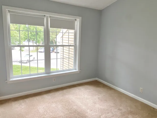 a view of a hallway with closet area