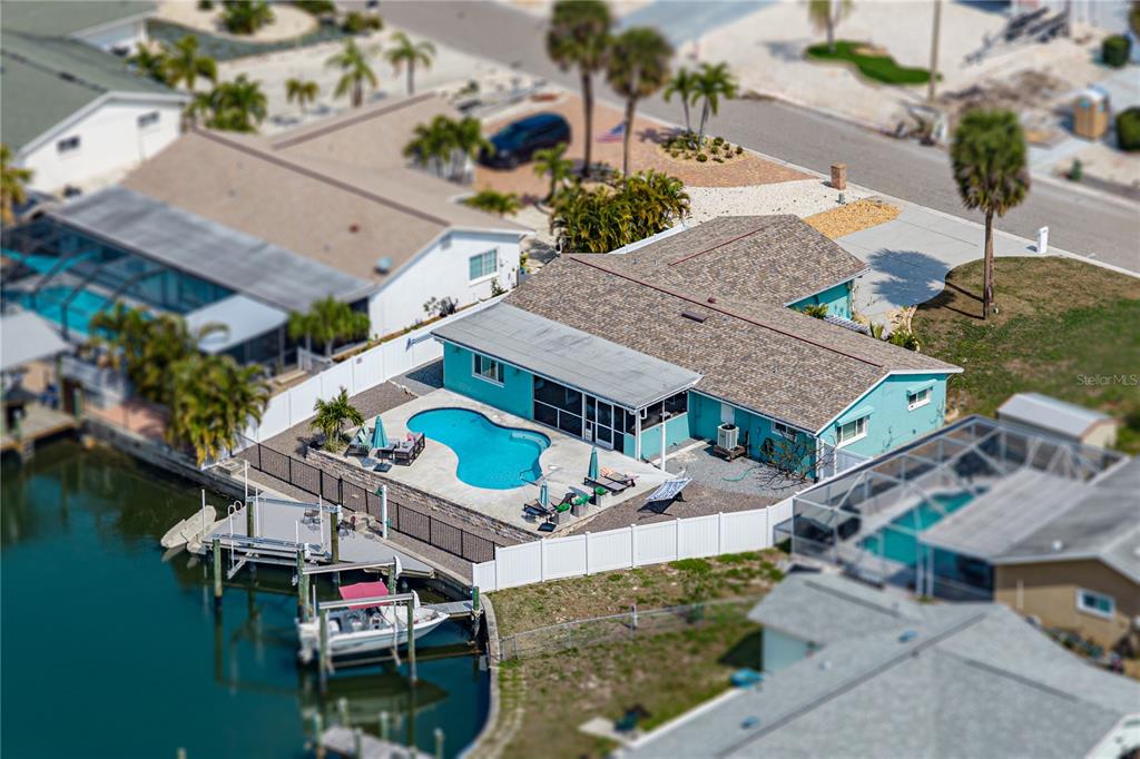1004 Sago Palm Way Apollo Beach, FL 33572 - Photo 2 of 92 an aerial view of a house with garden space and street view